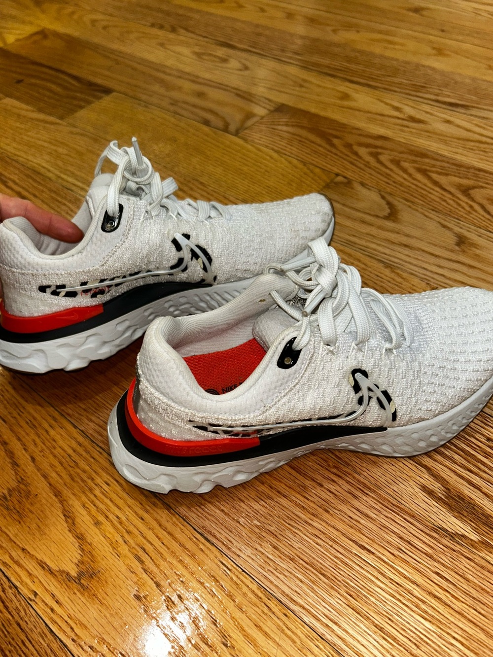 Nike White Athletic Sneakers with leopard Black and Red Accents
